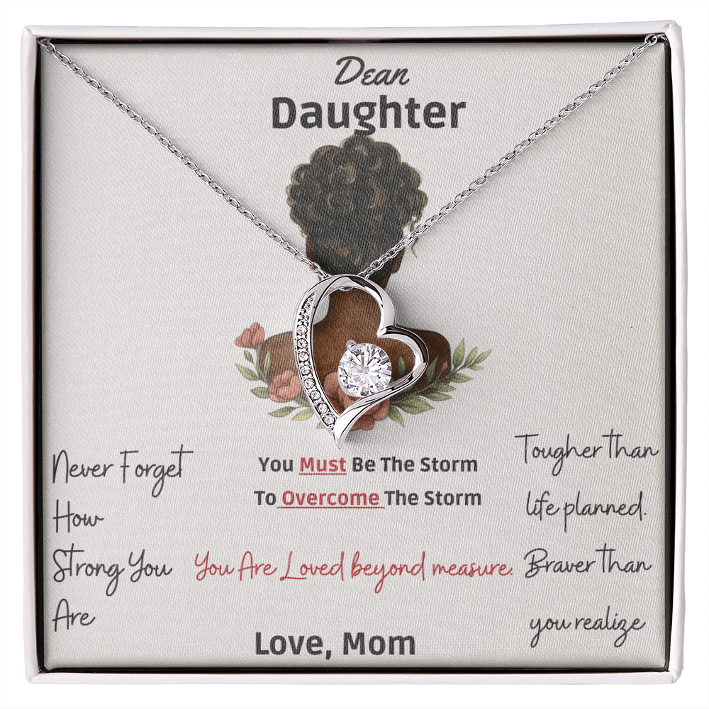 Engraved mother to daughter necklace reading “Never forget how strong you are” with floral motif pendant
